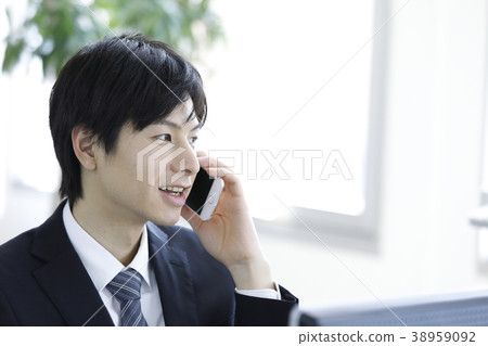 A young businessman A young businessman 38959092