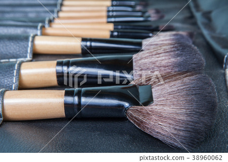 Set of  makeup brushes in row black leather cover  38960062