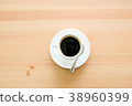 Cup of hot coffee amaricano on the wooden 38960399
