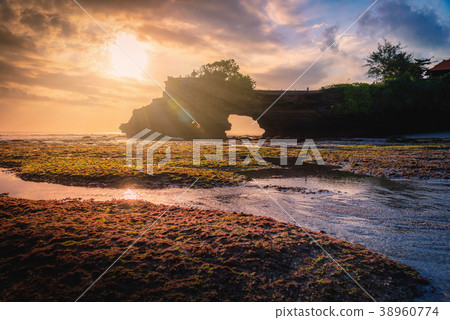 Tanah Lot Temple on sea at sunset in Bali Island Tanah Lot Temple on sea at sunset in Bali Island 38960774