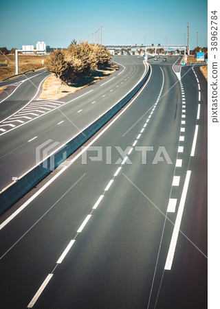Miltilane highway with a toll payment point 38962784