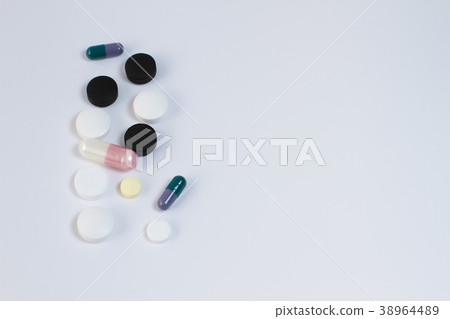 Pills on white background Pills on white background 38964489