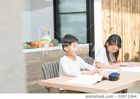 Family siblings study dining kitchen lifestyle homework assigning elementary school students Family siblings study dining kitchen lifestyle homework assigning elementary school students 38971064