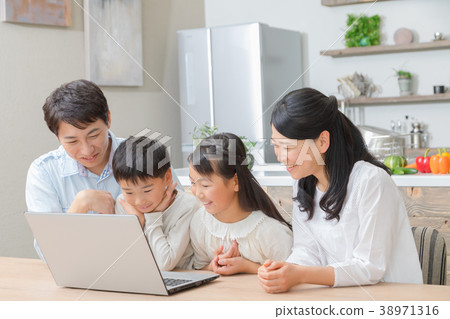 Family using a personal computer Father Dad Mother Mother Sister study 38971316