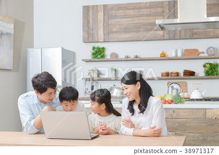 Family using a personal computer Father Dad Mother Mother Sister study 38971317