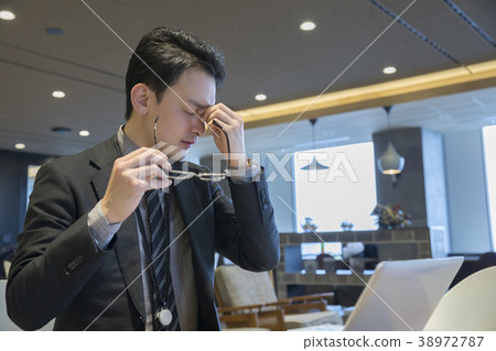 Businessman man holding eyes Businessman man holding eyes 38972787