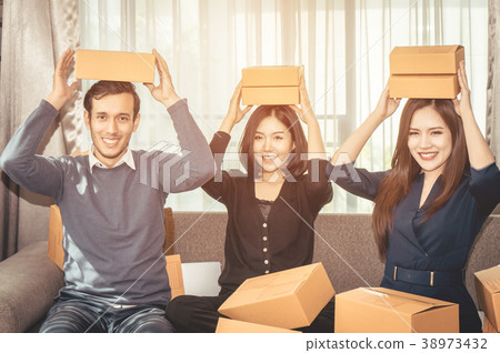 Team of start up business celebrating sale order Team of start up business celebrating sale order 38973432
