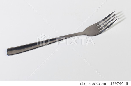 dining fork over white background dining fork over white background 38974046