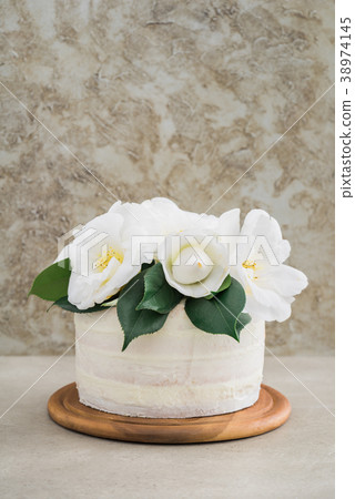 Naked wedding cake with camellias Naked wedding cake with camellias 38974145