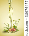 Argan oil splash with argan fruits 38976477