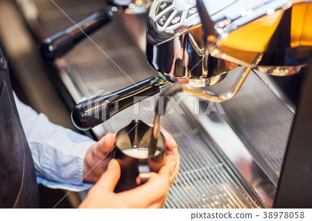 coffee machine makes two coffee with coffee beans. 38978058