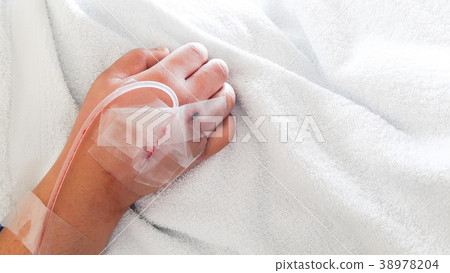 Closeup saline water line on a hand 38978204