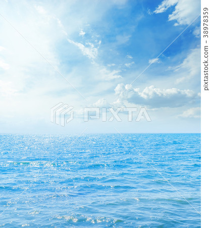 blue sea and clouds with sun 38978359