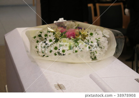 Bouquet placed on the coffin 38978908
