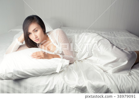 Woman in white nightgown Can't Sleep Woman in white nightgown Can't Sleep 38979091