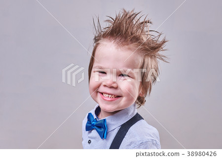 Little handsome boy in the bow tie smiling Little handsome boy in the bow tie smiling 38980426