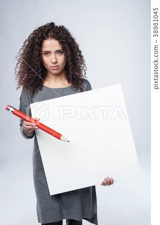 Curly woman with whiteboard Curly woman with whiteboard 38981045