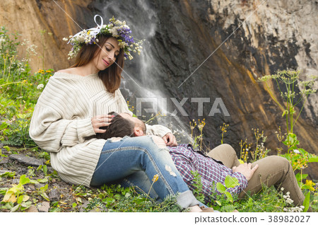 A loving couple of hipsters on walks 38982027