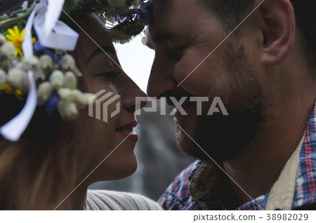 Close up Portrait of a loving couple of hipsters Close up Portrait of a loving couple of hipsters 38982029