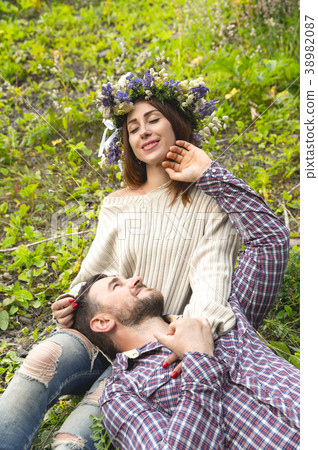 A loving couple of hipsters on walks 38982087