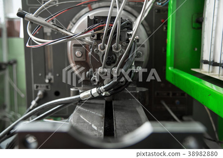 close-up high pressure diesel fuel pump test bench close-up high pressure diesel fuel pump test bench 38982880