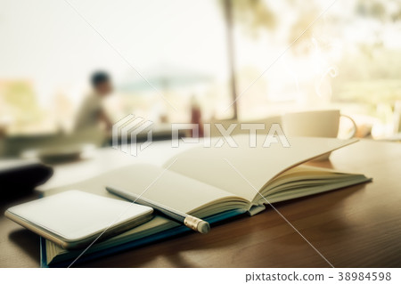 White hot coffee cup on wooden table  38984598