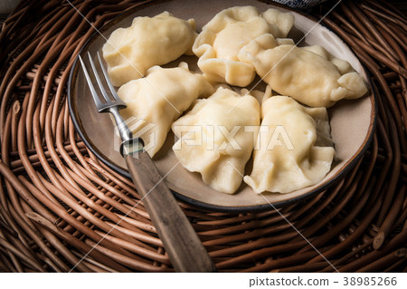 Homemade dumplings with cheese. Homemade dumplings with cheese. 38985266