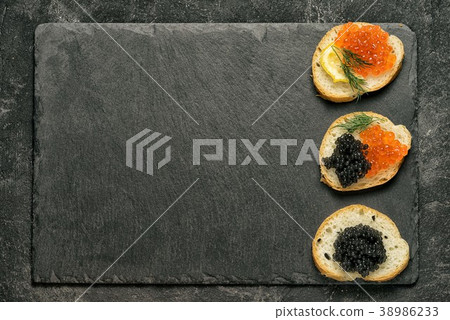 sandwiges with red and black caviar  38986233