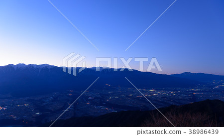 Nagano Central Alps and the night view of Komagane city 38986439