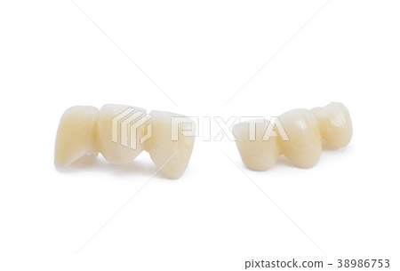 Ceramic dentures on white background Ceramic dentures on white background 38986753