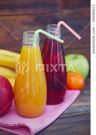 Fresh organic fruit Juice in glass Bottle on 38986822