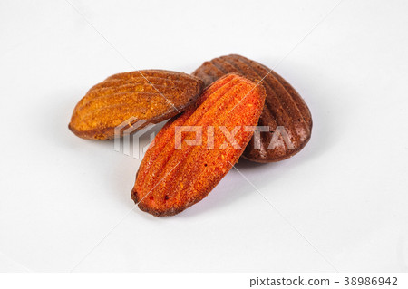 Madeleine cookies on white background Madeleine cookies on white background 38986942