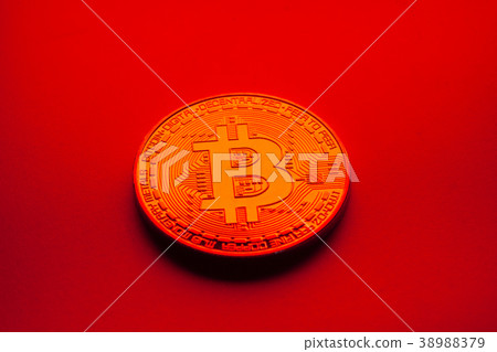 Bitcoin blockchain cryptocurrency coins on a red Bitcoin blockchain cryptocurrency coins on a red 38988379