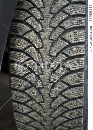 worn out tread of winter car tire worn out tread of winter car tire 38989111