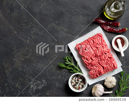 raw minced beef on light gray cement background 38989539