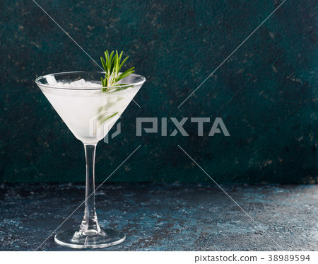 Glass of Martini coctail with fresh rosemary 38989594