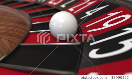 Casino roulette wheel ball hits 19 nineteen red 3D 38990332