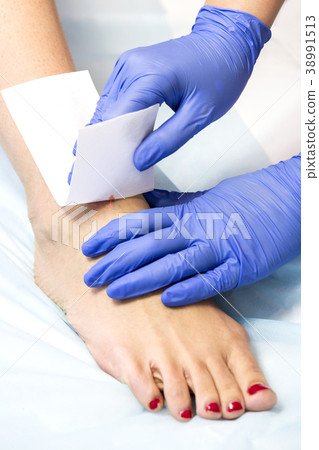 The process of classical wax depilation of female The process of classical wax depilation of female 38991513