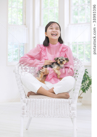 Girl and yorkshire terrier 38993396