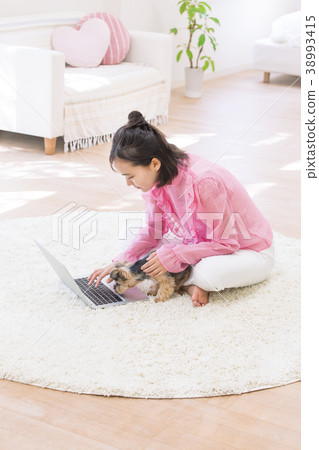 Girl and yorkshire terrier 38993415