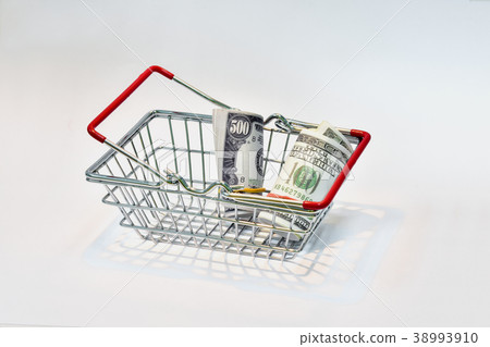 A shopping basket with a dollar bill 38993910