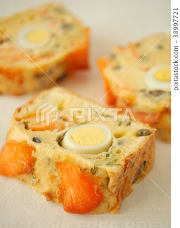 Cake kesare cut of smoked salmon and quail eggs (vertical position up 38997721
