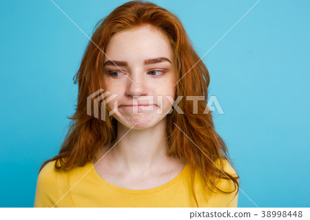 Headshot Portrait of tender redhead teenage girl Headshot Portrait of tender redhead teenage girl 38998448