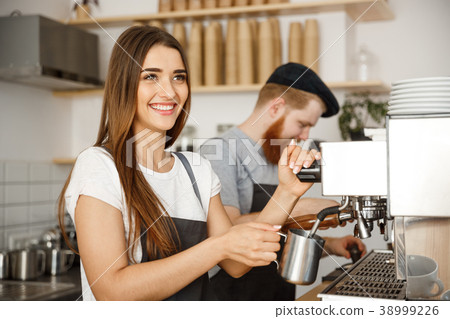 Coffee Business Concept - portrait of lady barista 38999226
