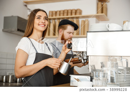 Coffee Business Concept - portrait of lady barista 38999228