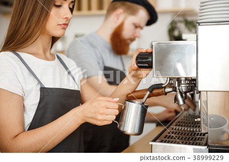 Coffee Business Concept - portrait of lady barista 38999229
