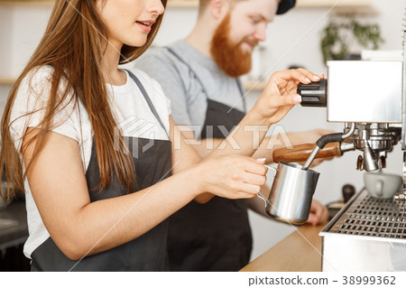 Coffee Business Concept - portrait of lady barista 38999362
