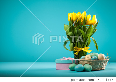 Yellow tulips on blue background Yellow tulips on blue background 39001557
