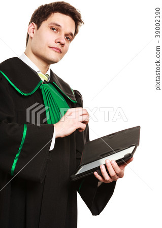 Young male lawyer hold tablet computer in open case. Young male lawyer hold tablet computer in open case. 39002190