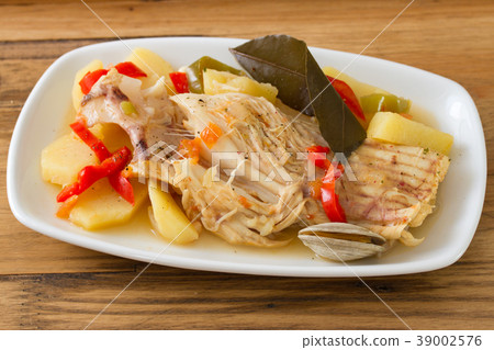 fish stew on white dish 39002576